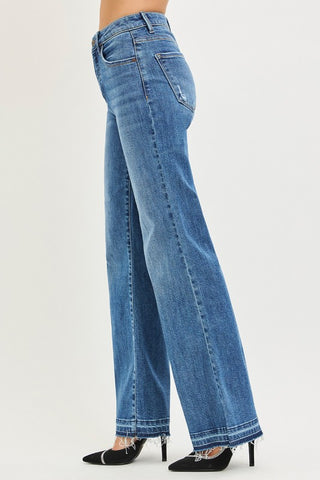Risen High Rise Wide Leg Jeans With Released Hem