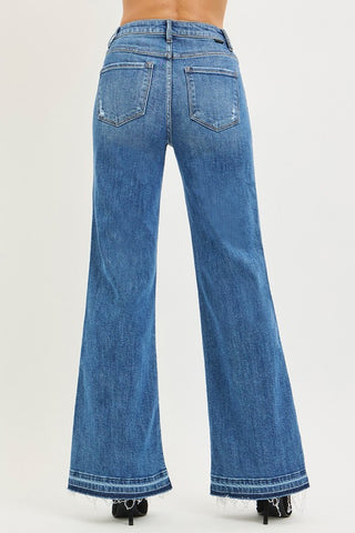 Risen High Rise Wide Leg Jeans With Released Hem